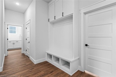 Welcome to East Village! This thoughtfully designed 3-bedroom, 2 on Vache-Grasse Country Club in Arkansas - for sale on GolfHomes.com, golf home, golf lot