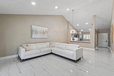 Superior in every way! This stunning fully renovated 2-bedroom on Eastpointe Country Club in Florida - for sale on GolfHomes.com, golf home, golf lot