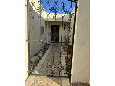 ON THE GOLF COURSE with beautiful views of the greens, lake, and on Omni Tucson National Golf Resort and Spa - Catalina in Arizona - for sale on GolfHomes.com, golf home, golf lot