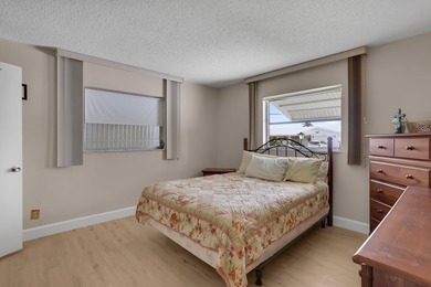 Welcome to this beautifully maintained 2-bedroom, 2-bath on Leisureville Community Golf Course in Florida - for sale on GolfHomes.com, golf home, golf lot