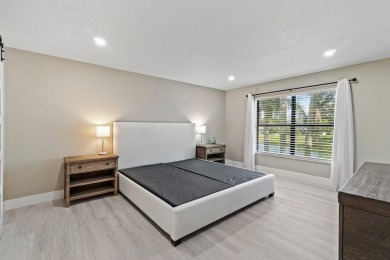 Superior in every way! This stunning fully renovated 2-bedroom on Eastpointe Country Club in Florida - for sale on GolfHomes.com, golf home, golf lot