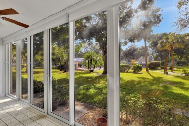 Welcome home to this desirable ground floor condo in one of the on Wynmoor Golf Course in Florida - for sale on GolfHomes.com, golf home, golf lot
