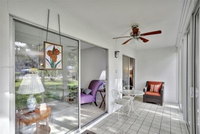 Welcome home to this desirable ground floor condo in one of the on Wynmoor Golf Course in Florida - for sale on GolfHomes.com, golf home, golf lot