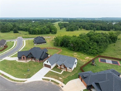 Welcome to East Village! This thoughtfully designed 3-bedroom, 2 on Vache-Grasse Country Club in Arkansas - for sale on GolfHomes.com, golf home, golf lot