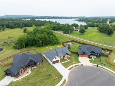 Welcome to East Village! This thoughtfully designed 3-bedroom, 2 on Vache-Grasse Country Club in Arkansas - for sale on GolfHomes.com, golf home, golf lot