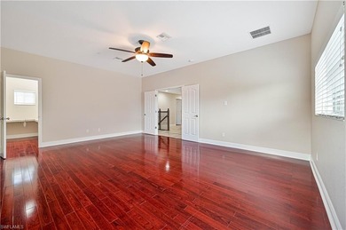 STUNNING, SPACIOUS 2ND-FLOOR END UNIT BOASTING NEARLY 2,000 on Gateway Golf and Country Club in Florida - for sale on GolfHomes.com, golf home, golf lot