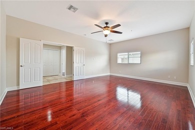STUNNING, SPACIOUS 2ND-FLOOR END UNIT BOASTING NEARLY 2,000 on Gateway Golf and Country Club in Florida - for sale on GolfHomes.com, golf home, golf lot