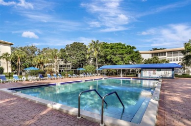 Welcome home to this desirable ground floor condo in one of the on Wynmoor Golf Course in Florida - for sale on GolfHomes.com, golf home, golf lot