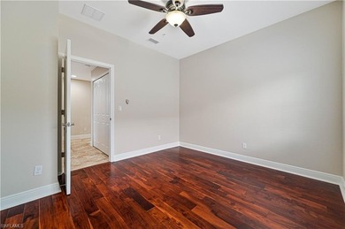 STUNNING, SPACIOUS 2ND-FLOOR END UNIT BOASTING NEARLY 2,000 on Gateway Golf and Country Club in Florida - for sale on GolfHomes.com, golf home, golf lot