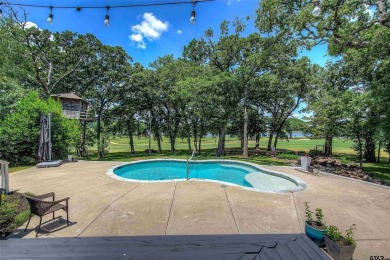 Nestled on an acre lot overlooking the 15th hole fairway of the on Sulphur Springs Country Club in Texas - for sale on GolfHomes.com, golf home, golf lot