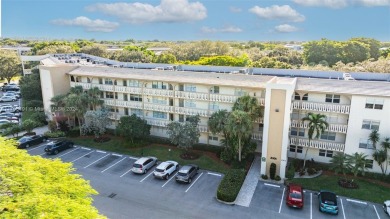 Welcome home to this desirable ground floor condo in one of the on Wynmoor Golf Course in Florida - for sale on GolfHomes.com, golf home, golf lot