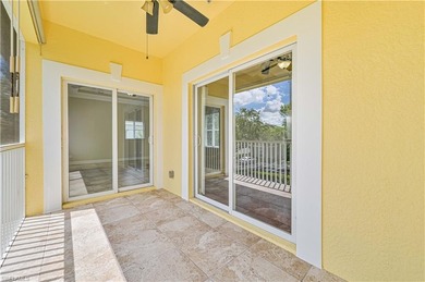STUNNING, SPACIOUS 2ND-FLOOR END UNIT BOASTING NEARLY 2,000 on Gateway Golf and Country Club in Florida - for sale on GolfHomes.com, golf home, golf lot