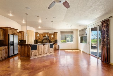 Well-kept home right on the golf course with red mountain views! on Green Spring Country Club in Utah - for sale on GolfHomes.com, golf home, golf lot