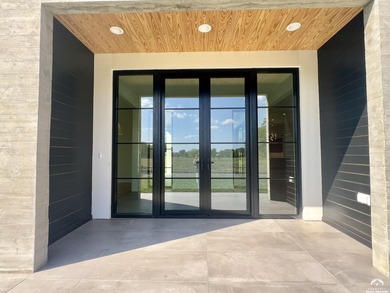 Located on a quiet, low-traffic street in the prestigious Oasis on Alvamar Country Club in Kansas - for sale on GolfHomes.com, golf home, golf lot