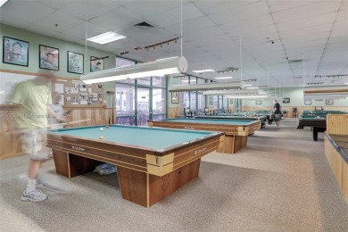 Welcome home to this desirable ground floor condo in one of the on Wynmoor Golf Course in Florida - for sale on GolfHomes.com, golf home, golf lot