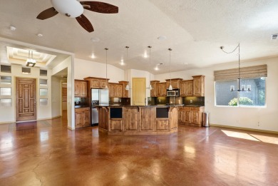 Well-kept home right on the golf course with red mountain views! on Green Spring Country Club in Utah - for sale on GolfHomes.com, golf home, golf lot