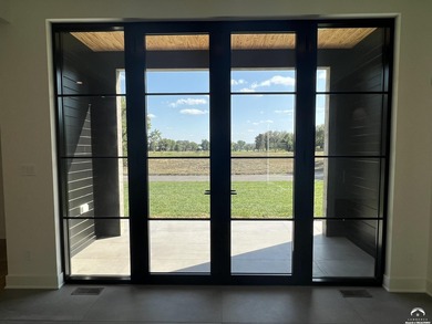 Located on a quiet, low-traffic street in the prestigious Oasis on Alvamar Country Club in Kansas - for sale on GolfHomes.com, golf home, golf lot