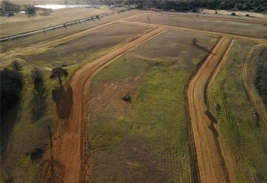 Check out this unique, oversized .36-acre lot in the gated, 1 on Rock Creek Golf Club in Texas - for sale on GolfHomes.com, golf home, golf lot