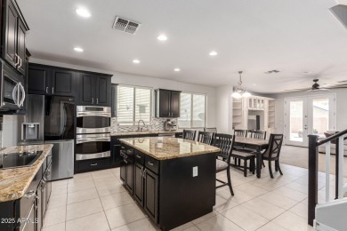 Gorgeous former model home located in the heart of Verrado! This on Verrado Golf Club  in Arizona - for sale on GolfHomes.com, golf home, golf lot