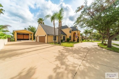 Tucked along the fairway in Rancho Escondido, this 4,037 sq ft on Rancho Viejo Resort and Country Club in Texas - for sale on GolfHomes.com, golf home, golf lot