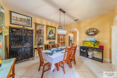 Tucked along the fairway in Rancho Escondido, this 4,037 sq ft on Rancho Viejo Resort and Country Club in Texas - for sale on GolfHomes.com, golf home, golf lot