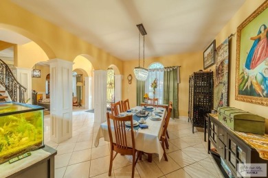 Tucked along the fairway in Rancho Escondido, this 4,037 sq ft on Rancho Viejo Resort and Country Club in Texas - for sale on GolfHomes.com, golf home, golf lot