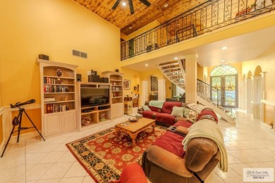 Tucked along the fairway in Rancho Escondido, this 4,037 sq ft on Rancho Viejo Resort and Country Club in Texas - for sale on GolfHomes.com, golf home, golf lot