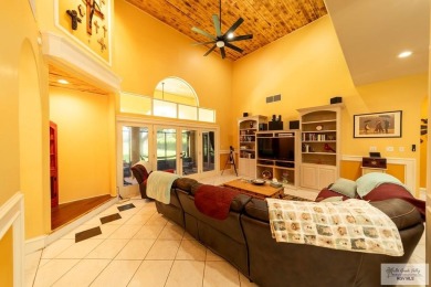 Tucked along the fairway in Rancho Escondido, this 4,037 sq ft on Rancho Viejo Resort and Country Club in Texas - for sale on GolfHomes.com, golf home, golf lot