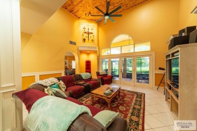 Tucked along the fairway in Rancho Escondido, this 4,037 sq ft on Rancho Viejo Resort and Country Club in Texas - for sale on GolfHomes.com, golf home, golf lot