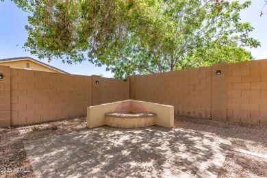 Gorgeous former model home located in the heart of Verrado! This on Verrado Golf Club  in Arizona - for sale on GolfHomes.com, golf home, golf lot