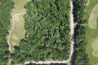 Just off the 9th hole at wonderful Porto Cima golf club.  This on The Club At Porto Cima in Missouri - for sale on GolfHomes.com, golf home, golf lot