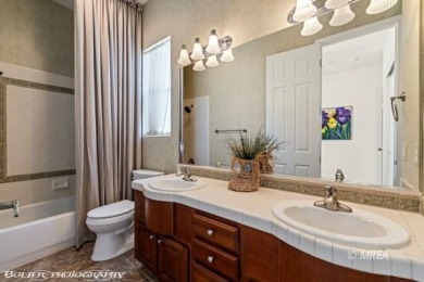 This rare, custom-designed 2,620 sq. Ft. Home on the Oasis on The Oasis Golf Club in Nevada - for sale on GolfHomes.com, golf home, golf lot