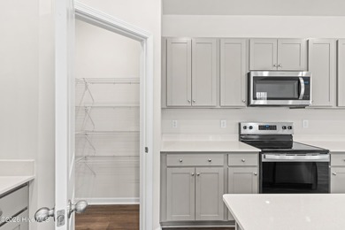 The Walker is a beautifully designed two-story home that blends on Harbour Point Golf Club in North Carolina - for sale on GolfHomes.com, golf home, golf lot