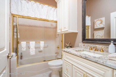 Enjoy luxury living with elegant indoor  outdoor features on Indian River Colony Club in Florida - for sale on GolfHomes.com, golf home, golf lot