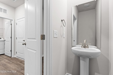 The Walker is a beautifully designed two-story home that blends on Harbour Point Golf Club in North Carolina - for sale on GolfHomes.com, golf home, golf lot