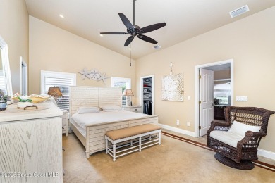 Enjoy luxury living with elegant indoor  outdoor features on Indian River Colony Club in Florida - for sale on GolfHomes.com, golf home, golf lot