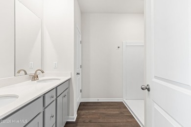 The Walker is a beautifully designed two-story home that blends on Harbour Point Golf Club in North Carolina - for sale on GolfHomes.com, golf home, golf lot