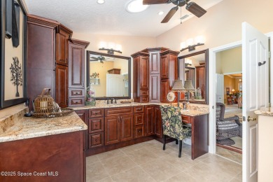 Enjoy luxury living with elegant indoor  outdoor features on Indian River Colony Club in Florida - for sale on GolfHomes.com, golf home, golf lot