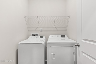 The Walker is a beautifully designed two-story home that blends on Harbour Point Golf Club in North Carolina - for sale on GolfHomes.com, golf home, golf lot