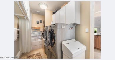 Enjoy luxury living with elegant indoor  outdoor features on Indian River Colony Club in Florida - for sale on GolfHomes.com, golf home, golf lot