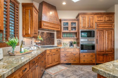 This stunning 3-bedroom, 3-bathroom home in the prestigious on Entrada at Snow Canyon in Utah - for sale on GolfHomes.com, golf home, golf lot