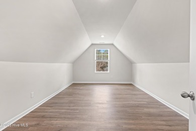 The Walker is a beautifully designed two-story home that blends on Harbour Point Golf Club in North Carolina - for sale on GolfHomes.com, golf home, golf lot