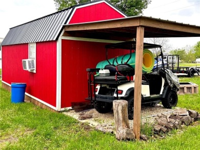 Here is the perfect set up for affordable lake living with so on Linn Valley Lakes - Deer Trace Golf Course in Kansas - for sale on GolfHomes.com, golf home, golf lot