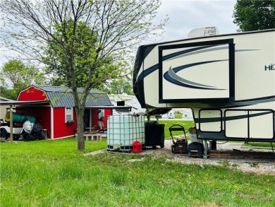 Here is the perfect set up for affordable lake living with so on Linn Valley Lakes - Deer Trace Golf Course in Kansas - for sale on GolfHomes.com, golf home, golf lot