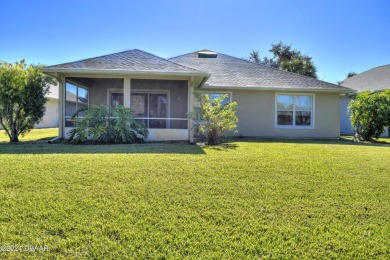 Welcome to your next haven with a scenic backyard view of the on Plantation Bay Golf and Country Club in Florida - for sale on GolfHomes.com, golf home, golf lot