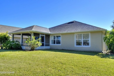 Welcome to your next haven with a scenic backyard view of the on Plantation Bay Golf and Country Club in Florida - for sale on GolfHomes.com, golf home, golf lot