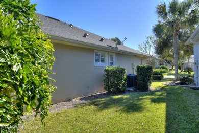 Welcome to your next haven with a scenic backyard view of the on Plantation Bay Golf and Country Club in Florida - for sale on GolfHomes.com, golf home, golf lot