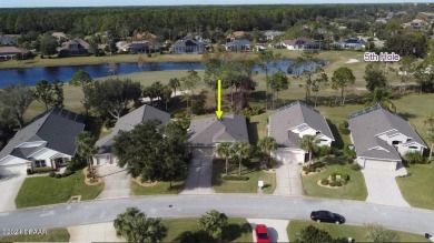 Welcome to your next haven with a scenic backyard view of the on Plantation Bay Golf and Country Club in Florida - for sale on GolfHomes.com, golf home, golf lot