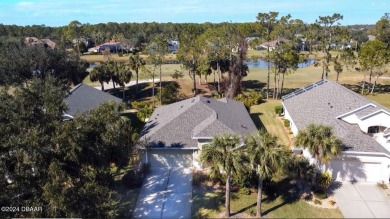 Welcome to your next haven with a scenic backyard view of the on Plantation Bay Golf and Country Club in Florida - for sale on GolfHomes.com, golf home, golf lot