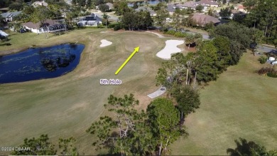 Welcome to your next haven with a scenic backyard view of the on Plantation Bay Golf and Country Club in Florida - for sale on GolfHomes.com, golf home, golf lot